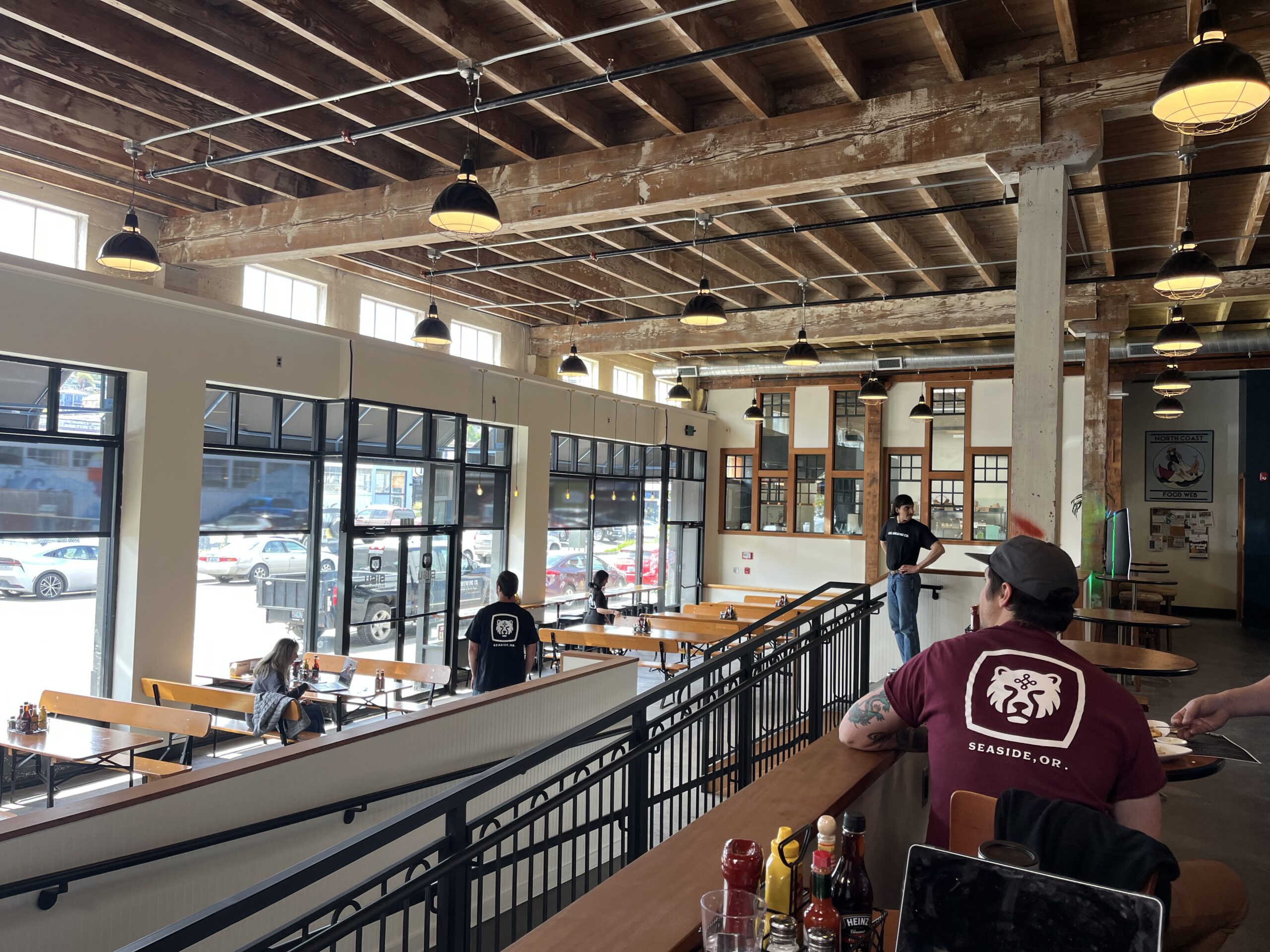 Bright dining room with big windows at Sisu Brewing Co Astoria