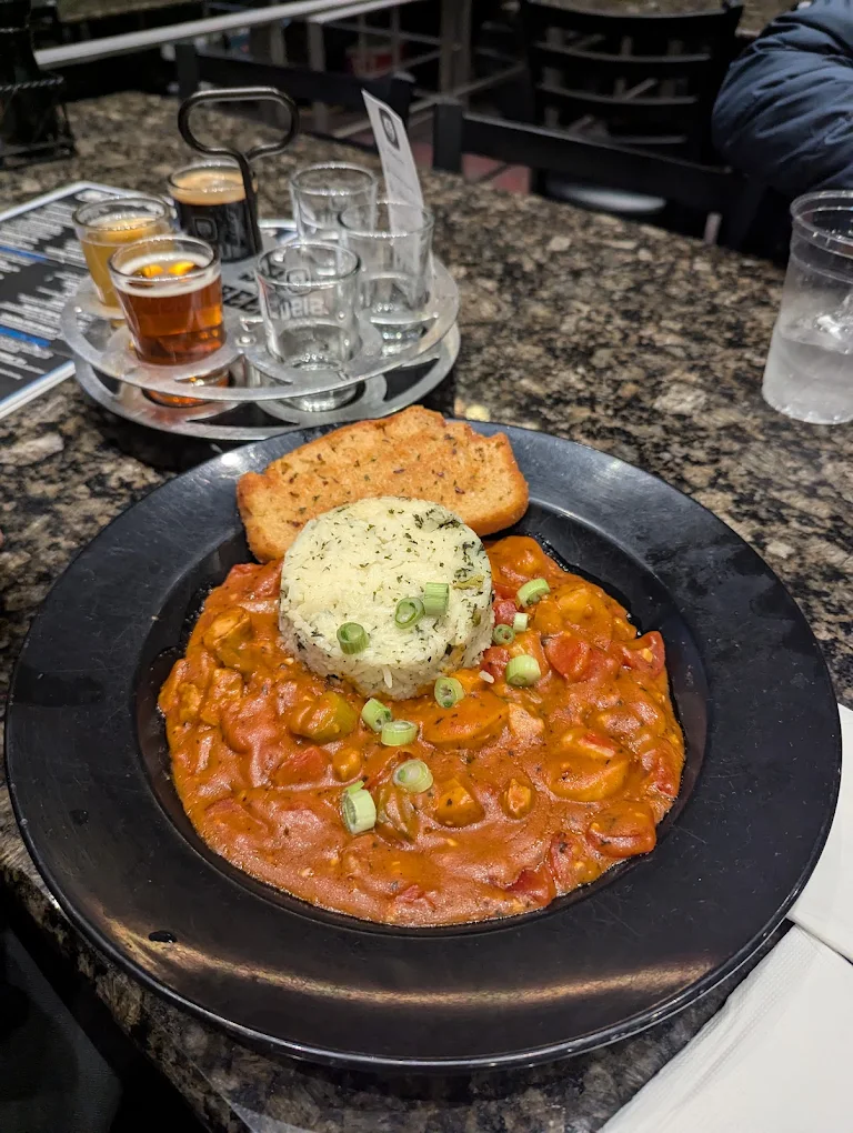 Pasta dish at Sisu Brewing Seaside Pasta in a tomato cream sauce topped with herb butter at Sisu Brewing Seaside