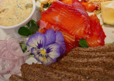 Smoked salmon platter with crackers, dip and pickled onions at Sisu Brewing Astoria