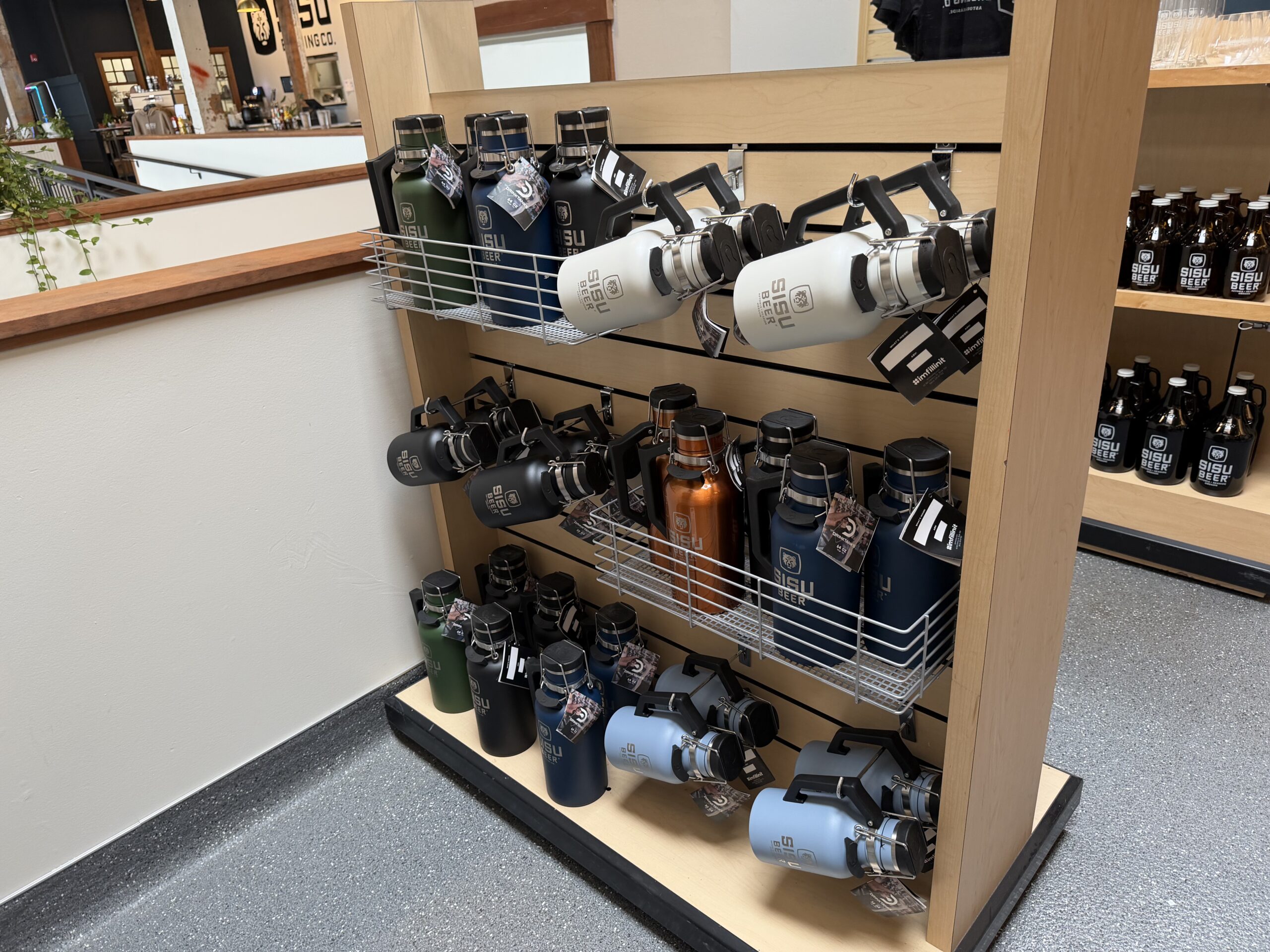 Sisu Beer insulated growlers and bottles Sisu Beer insulated growlers and bottles in green, navy, black, white, copper, and slate blue
